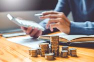 istockphoto-1346853640-612×612 Saving money concept Man hand putting Row and coin Write Finance Saving money concept Man hand putting Row and coin Write Finance